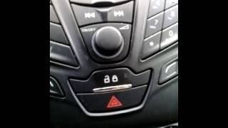 How to find door unlock switch on 2014 Ford Focus