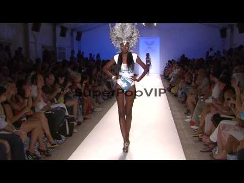 Models walk the runway during the Lisa Blue swimwear 2013...