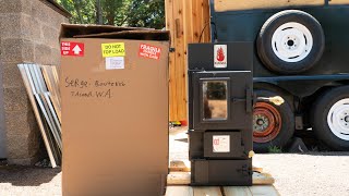Sauna Trailer Step 28: Installing the Best Wood Stove in the Universe!