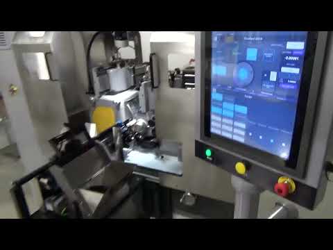 Infeed and Thrufeed Centerless Grinder with Robotic Automation