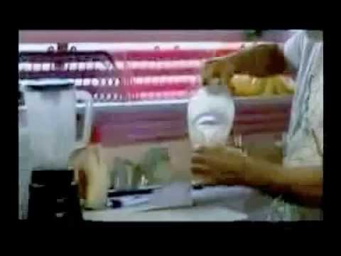 Andrew Zimmern of 'Bizarre Foods' samples Mr. Wisdom's Wheatgrass