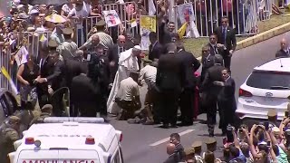 Pope Francis stops popemobile to comfort Chilean policewoman who fell from horse