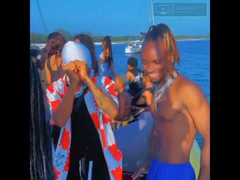 PRODUCER CLASSIC AND MR LG TZ DANCING AT THE YACHT PARTY IN DAR ES SALAAM