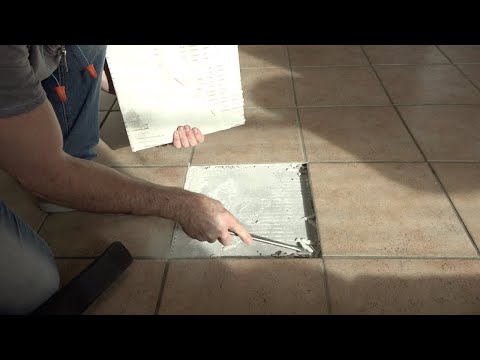 Removing popped tiles and putting them back down
