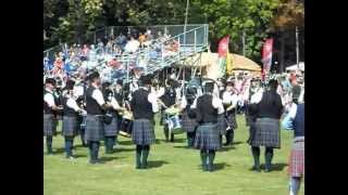 preview picture of video '2014 Ligonier Highland Games # 11 Band judging and Caber Toss  1'