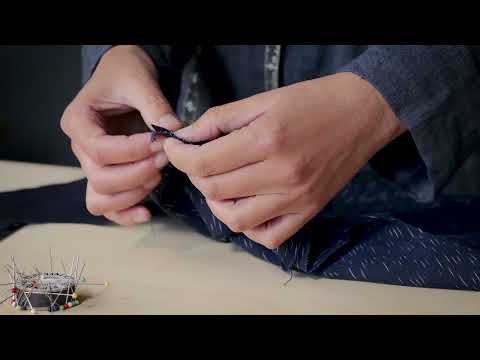 Part of a video titled How To Sew: Attach A Yoke - YouTube