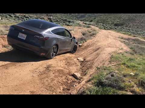 Stock Tesla Model 3 4-wheeling (offroad) some rough terrain 2, no problem