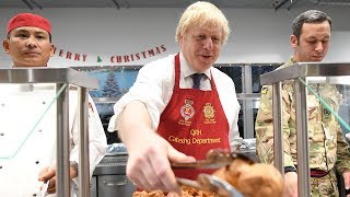 video: Boris Johnson praises 'tireless' British troops as he serves Christmas lunch at Estonia base