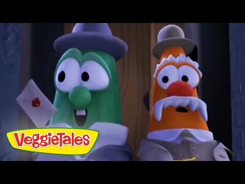 Two VeggieTales characters—a green cucumber and an orange carrot with a mustache—stand side by side, holding a letter with a red seal, looking surprised.