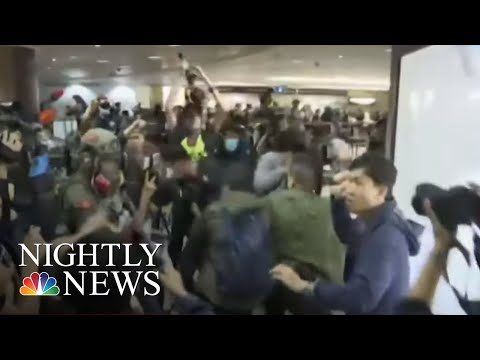 Demonstrators Stage Anti-Government Christmas Eve Protests In Hong Kong | NBC Nightly News