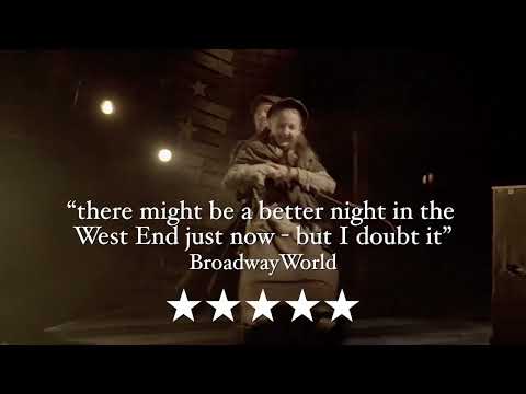Trailer montage: factory belts, period cameras, and ensemble lines — the album’s vaudeville and symphonic colors