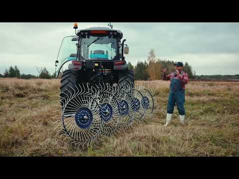 Трактор SCOUT: покос сена роторной косилкой DM-165 и ворошение граблями PL-5600