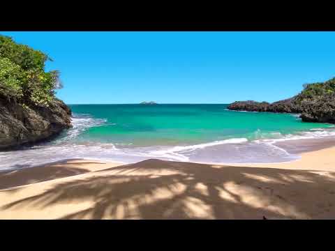 Splashing Waves All Day on Playa Encuentro   Refreshing and Relaxing on a Hot Summer Beach