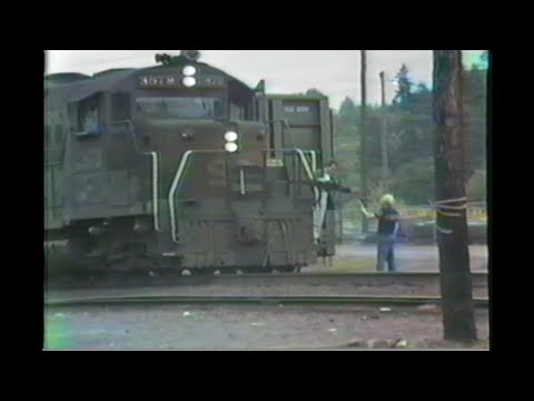 692. SOUTHERN PACIFIC YARD local crew HANDS OFF RADIO as they depart Station depot for Eugene yard