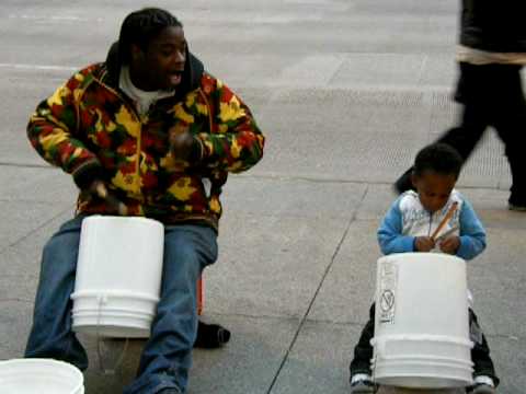 Father & son street drumming in Chicago