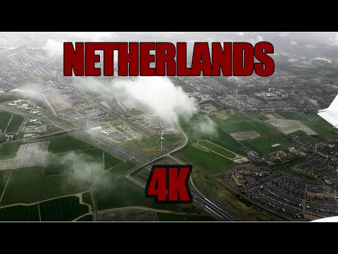 Flying over the Netherlands with final landing to Amsterdam airport - 4K UHD
