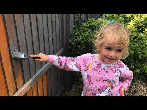 Painting the fence with my Mum