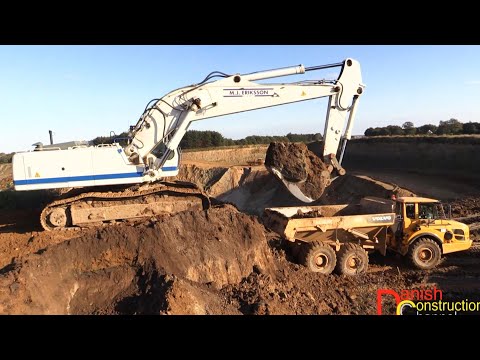 Liebherr R954C Loading Volvo Dumpers