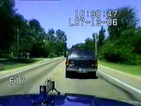 Cops smash SUV off the road