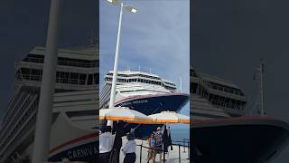 Carnival Freedom and Carnival Dream side by side at Celebration Key #cruise