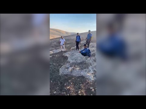 Israeli settler threatens to set dogs on children's route to school, Khan al-Ahmar, 13 Oct. 2024