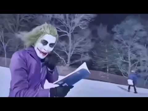 Batman chases the joker on skis
