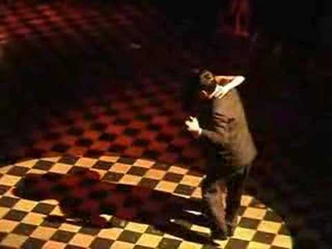  Gladys Fernandez  and  Ricardo Luis Gallo  are  dancing  to  the  milonga  "  No Hay Tierra Como La Mia  "