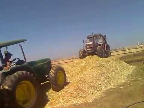 John Deere 5605  and FIATAGRI  80 90 packing silage