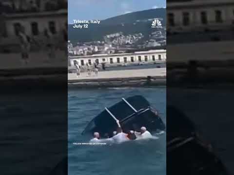 Italian army cadets save a driver from a sinking car
