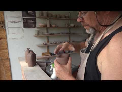 How to paddle and alter the form of a thrown cylindrical bottle !