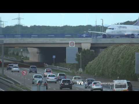 Airplane over autobahn