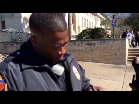 Click to Watch the Terrifying moment officer tickets preacher for 'offending' people (VIDEO) video