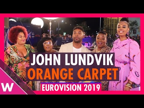 Sweden's John Lundvik and his Mammas sing on Eurovision 2019 Orange Carpet
