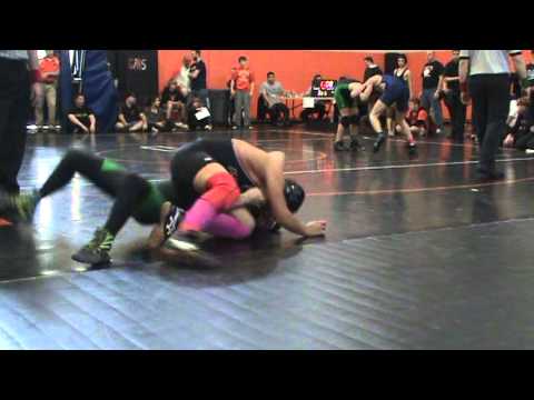 Christian Correa from New Milford wrestling Kenny Pena