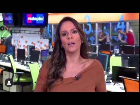 Globo employees engage in hand sanitizer fight during live news broadcast