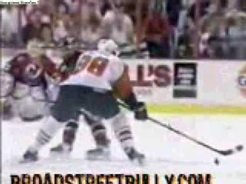 Scott Stevens hits Eric Lindros