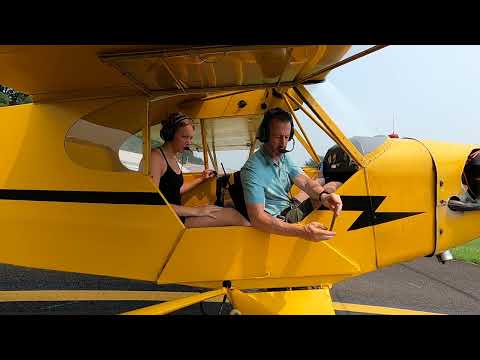 Yes, she's really flying the cub.