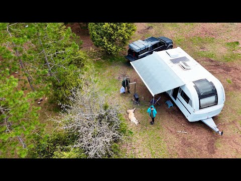 LUXURY CARAVAN CAMPING IN FOREST WITH STOVE UNDER HEAVY RAIN