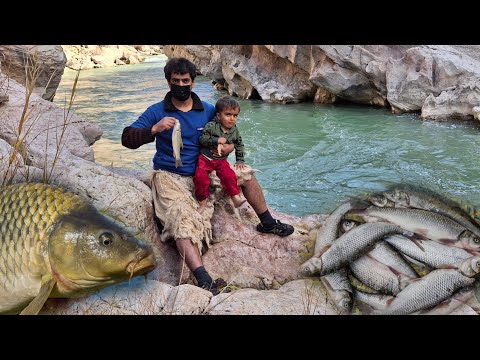 Fishing from the river: Bardia and Yasin🐟🌊