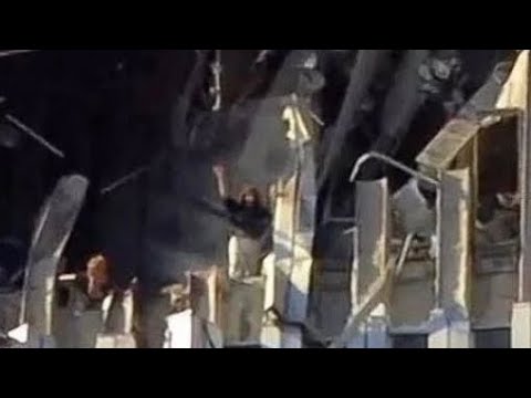 Good quality video of edna cintron waving on the north tower of wtc