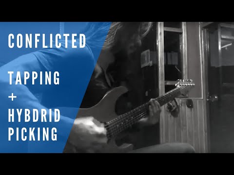 Soloing over Conflicted (Kiko Loureiro) Hybrid Picking + Tapping