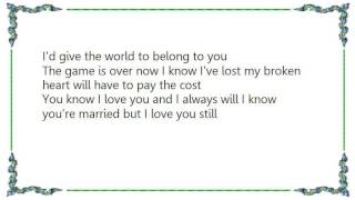 Buck Owens - I Know You&#39;re Married But I Love You Still Lyrics