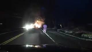 Monroe Township officer saves driver from burning car