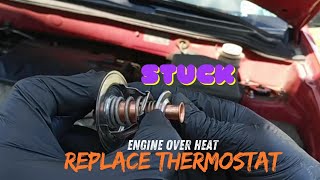 Step by step instructions for replacing thermostat and maintaining engine temperature control
