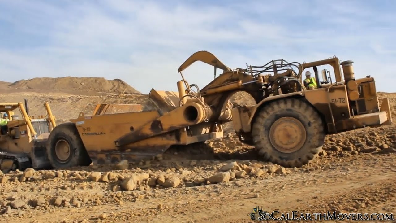 CAT 651B Scrapers Shifting Sandstone