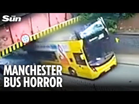 Moment Manchester bus roof RIPPED off after crashing into 'low' bridge