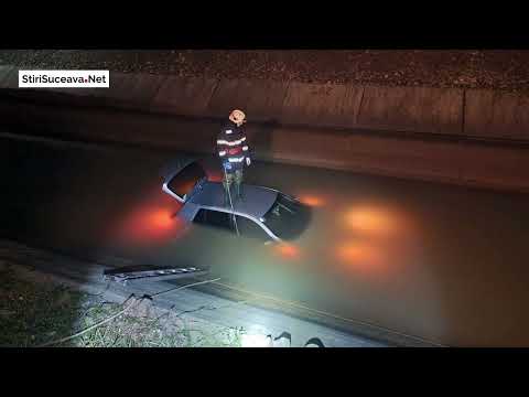Mașină căzută într-un canal cu apă, la Bilca