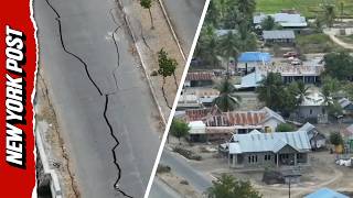 Download lagu Rekaman Drone Menunjukkan Kerusakan Luas di Kota Pesisir Indonesia Setelah Gempa Bumi mp3