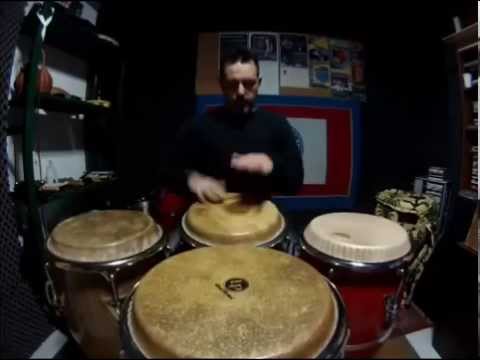 Luca Mattioni studying with 4 congas