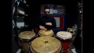 Luca Mattioni studying with 4 congas